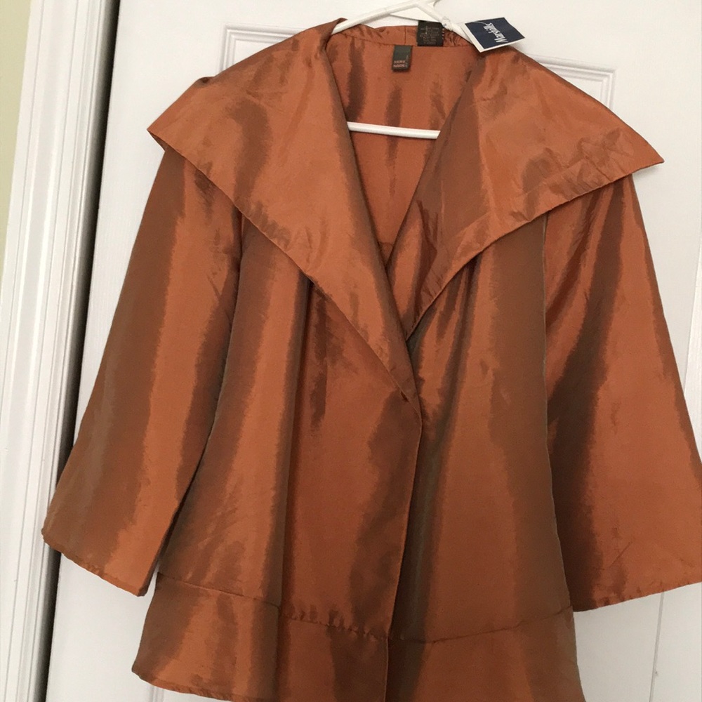 NWT Copper color peplum top, size large.